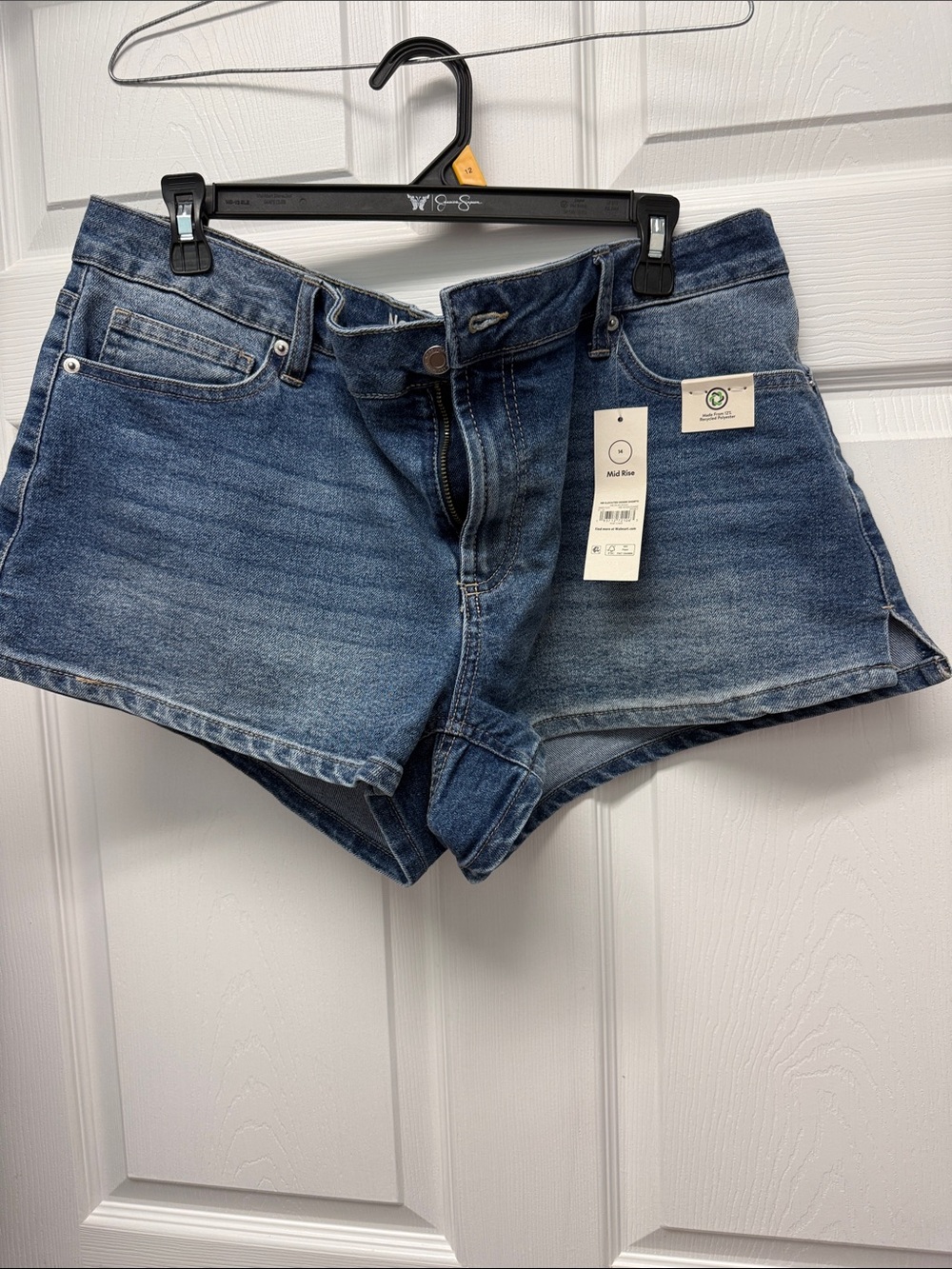 Mid-Rise Blue Denim Jean Shorts with bow accents on back pockets